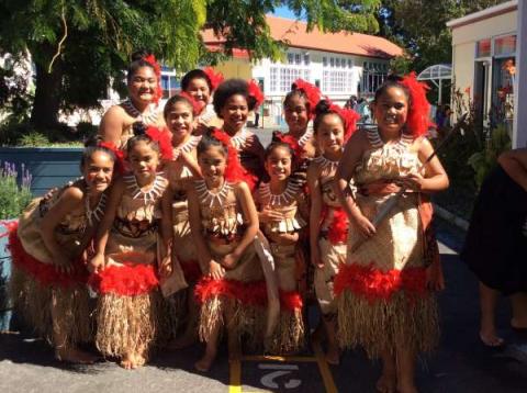 Kids in indigenous pacific costume at may road school